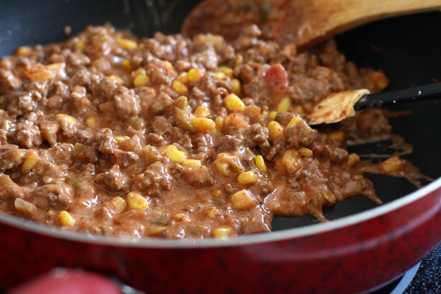 Beef nacho casserole is loaded with meat, corn, salsa, cheese, tortilla chips and spices for great tasting dinner everyone will love!