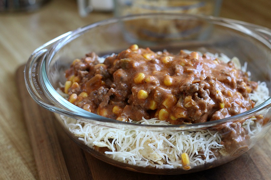 Beef nacho casserole is loaded with meat, corn, salsa, cheese, tortilla chips and spices for great tasting dinner everyone will love!