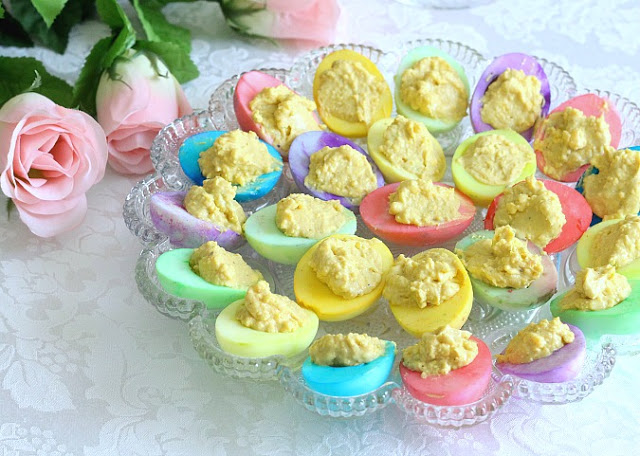 A lovely Easter brunch menu includes baked ham with pineapple glaze, quiche Lorraine, roasted asparagus, deviled eggs, fruit, assorted breads and dessert. Easter is often a time of family gatherings, sunrise church services, fancy clothes and colorfully dyed eggs and a special meal.