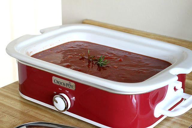 A delicious slow cooker tomato pasta sauce is perfect for those busy days and you still need a meal to feed the hungry. Ladle over your favorite pasta. 