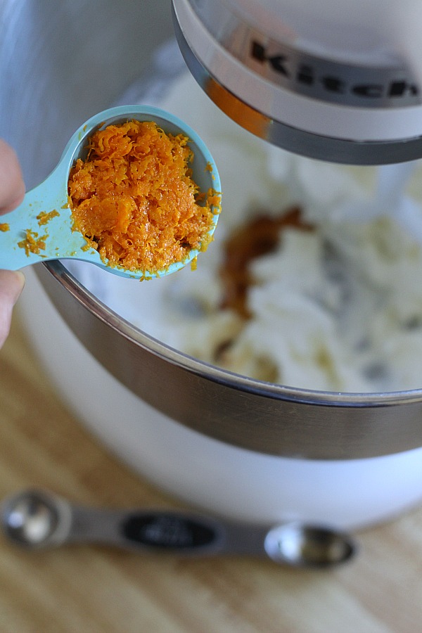 Super easy recipe for a delicious orange fruit dip made with cream cheese, orange zest, orange juice, cream and confectioners' sugar. It is the best!