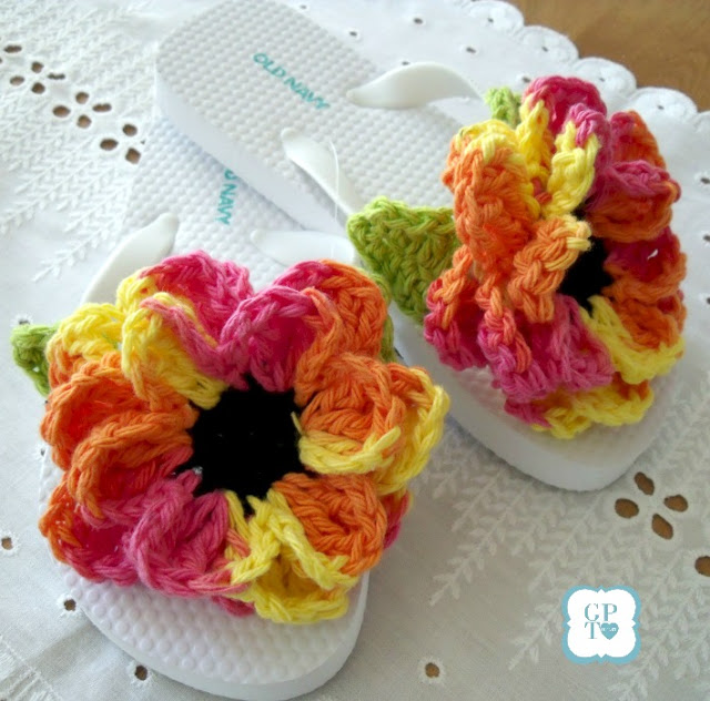 Dress up inexpensive flip flops with easy to make crochet flowers for summer fun. How-to instructions for attaching and flowers pattern.