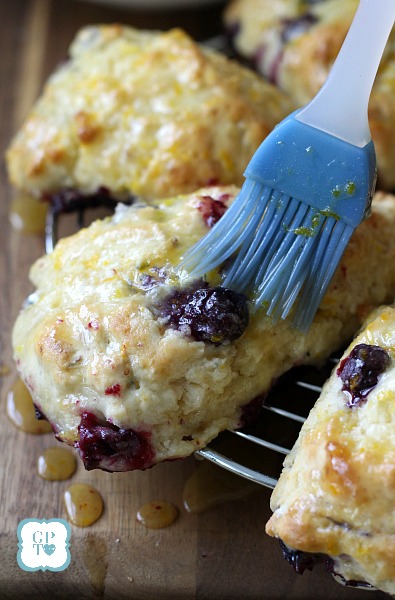 Delicious scones filled with blueberries with an orange or lemon glaze on top. Perfect for breakfast or at break time with your coffee or tea.