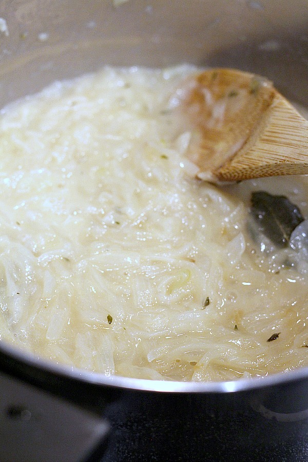 Easy recipe for French Onion soup in a rich beef broth with sweet caramelized onions and topped with toasted baguette and melty cheese. 