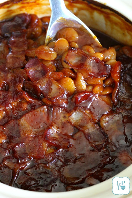 Homemade, old fashioned baked beans take a little time but so worth it! Tender navy or Lima beans in a brown sugar and molasses sauce is a perfect side. 