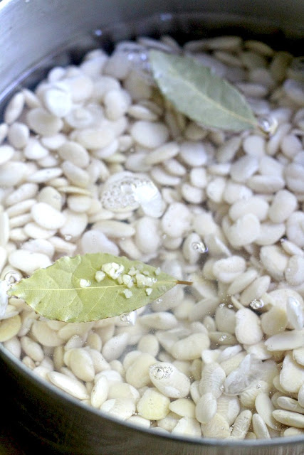 Homemade, old fashioned baked beans take a little time but so worth it! Tender navy or Lima beans in a brown sugar and molasses sauce is a perfect side. 