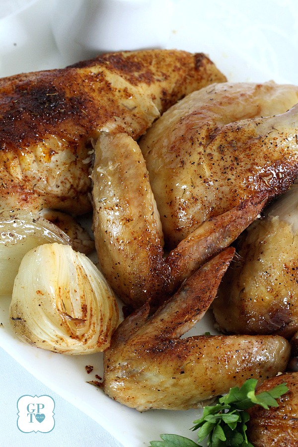 Easy recipe for moist and tender chicken, slow roasted in the oven with dry rub spices. 