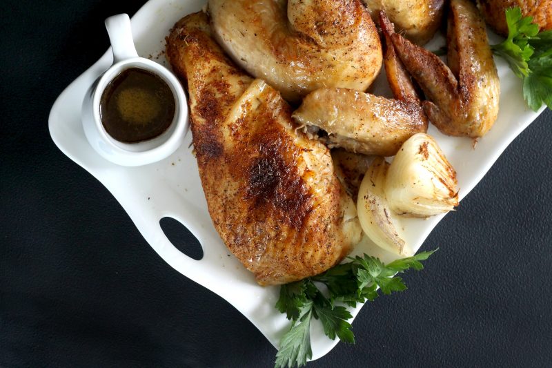 Easy recipe for moist and tender chicken, slow roasted in the oven with dry rub spices. 