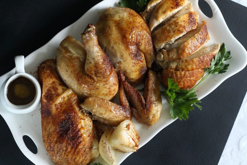 Easy recipe for moist and tender chicken, slow roasted in the oven with dry rub spices. 