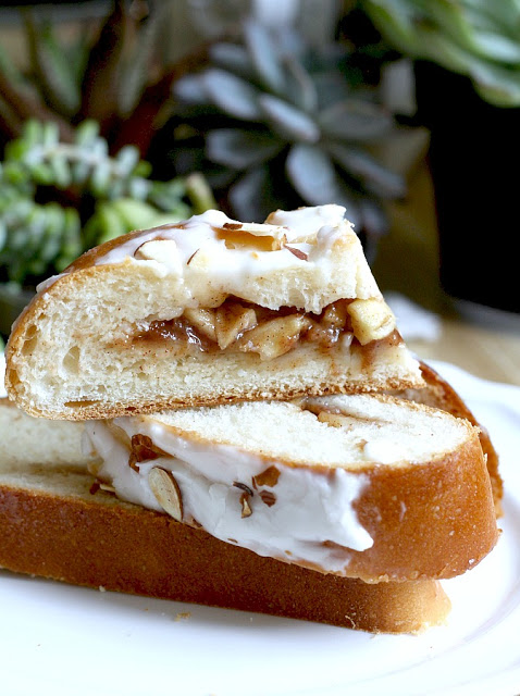 Frosted Apple Danish Braid made easy with dough from Bread Machine. Filled with cinnamon and apples and topped with frosting and toasted almonds. Breakfast or snack treat!