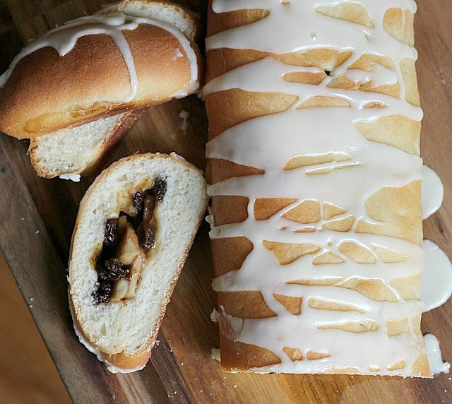 Frosted Apple Danish Braid made easy with dough from Bread Machine. Filled with cinnamon and apples and topped with frosting and toasted almonds. Breakfast or snack treat!