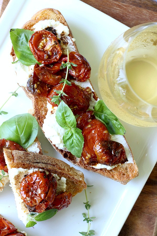 Visit to London Covent Garden and Jamie Oliver restaurant inspired this easy recipe for roasted cherry tomato and basil bruschetta with creamy ricotta. A fresh and delicious summertime appetizer or entree.