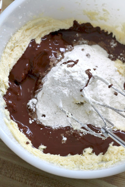 Decadent Chocolate Espresso Whoopie Pies are sandwiched together with a light and fluffy frosting with more coffee flavor! Perfect for dads for Father's Day.