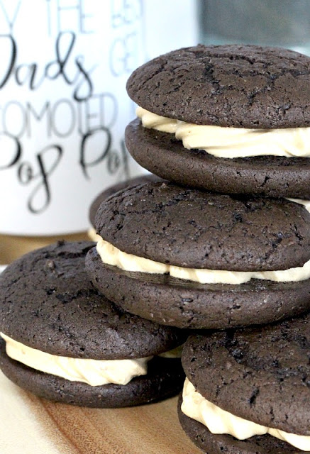 Chocolate Espresso Whoopie Pies are decadent and delicious. The dark chocolate cookie is rich and cake like. Or even brownie like, with a hint of coffee. Two cookies are sandwiched together with a frosting filling that is light and fluffy with more coffee flavor!