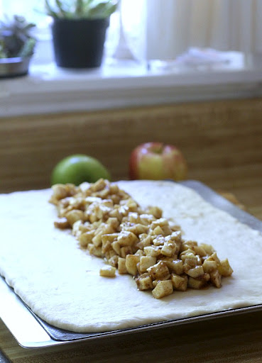 Frosted Apple Danish Braid made easy with dough from Bread Machine. Filled with cinnamon and apples and topped with frosting and toasted almonds. Breakfast or snack treat!