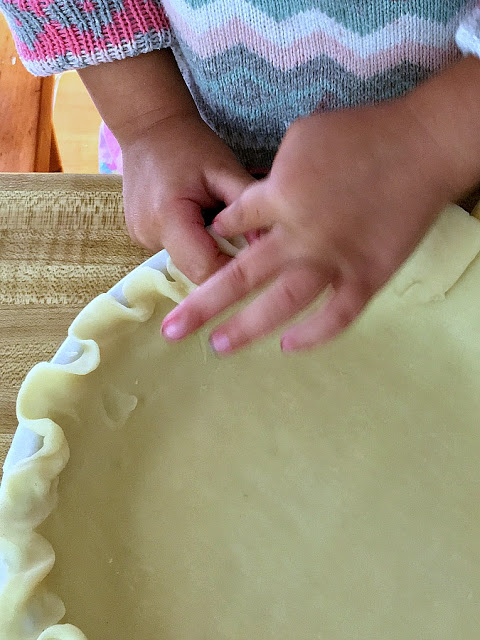 Strawberry Pie topped with whipped cream. Made this pie with two preschoolers for a fun and tasty baking-with-kids dessert.