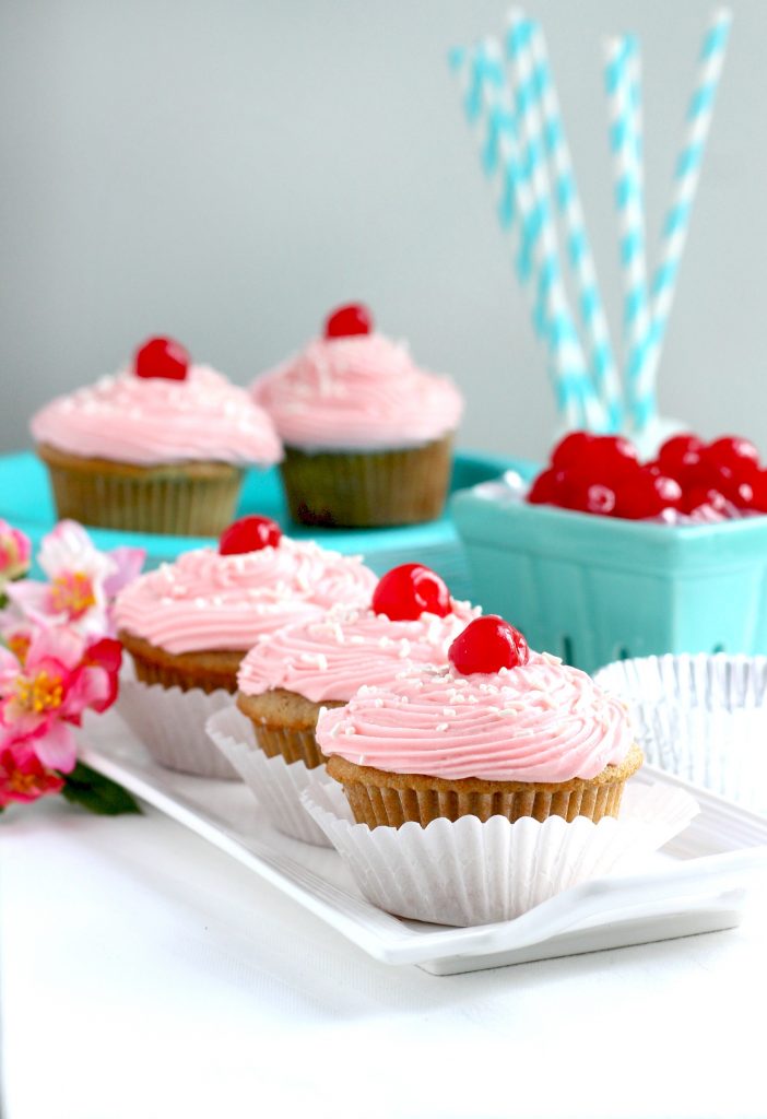 Vanilla Cupcakes with Cherry Buttercream Frosting: Easy recipe for vanilla cupcakes with cherry buttercream frosting. A delicious and fun recipe to make with kids.