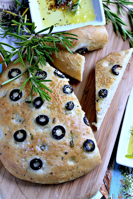 Rosemary Focaccia is irresistible, Dip in olive oil or slice for a sandwich, this Italian yeast bread is amazing. Easy recipe from bread machine dough.