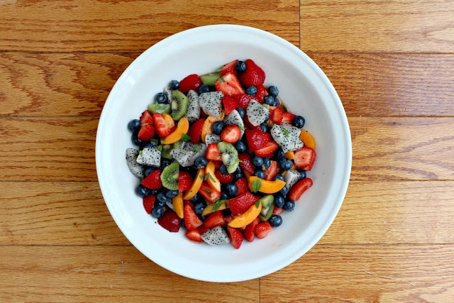 Gorgeous pink dragon fruit brightens this fresh fruit salad with a honey lime ginger dressing. Colorful, delicious and nutritious. 