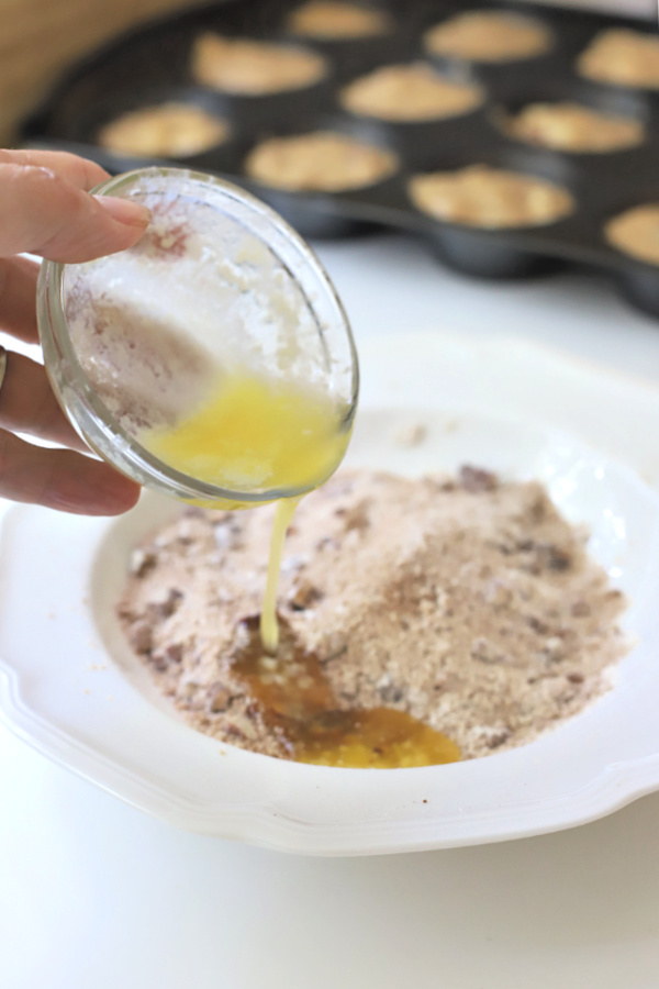 Making the crumb topping for pear, banana and walnut muffins.