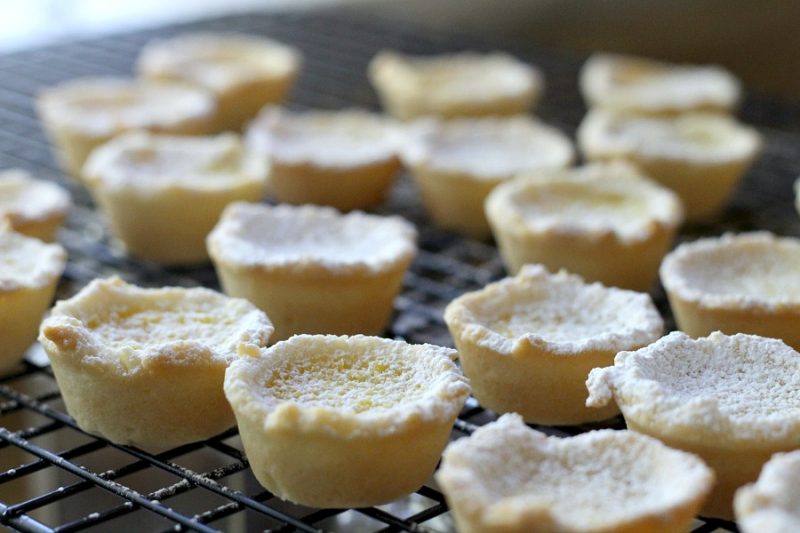 Lemon tartlets are tender little pie-like tartlets for every lemon lover! Easy how-to recipe for lemon tartlets with just the right amount of sweet and tart.