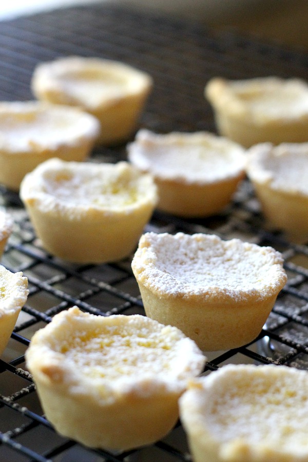 Lemon tartlets are tender little pie-like tartlets for every lemon lover! Easy how-to recipe for lemon tartlets with just the right amount of sweet and tart.