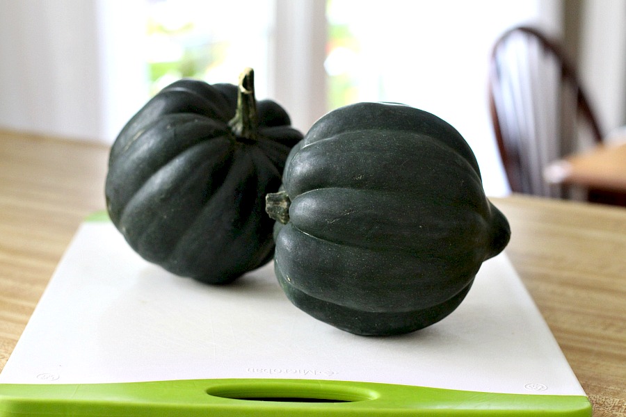 Baked acorn squash couldn't be easier. Bake the sliced and seeded squash with butter and maple syrup until fork tender. A lovely autumn side dish.