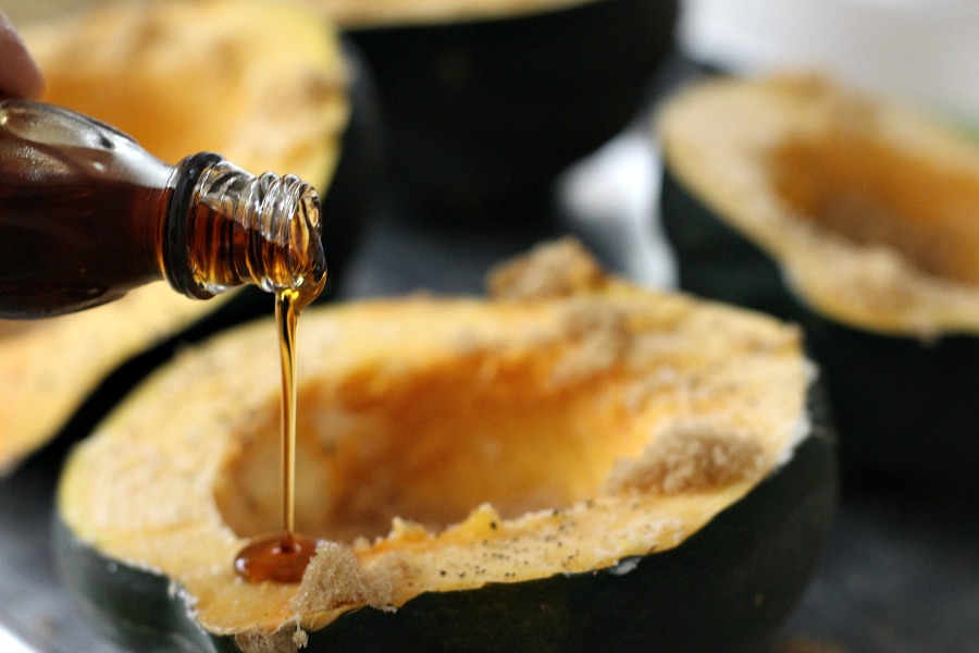 Baked acorn squash couldn't be easier. Bake the sliced and seeded squash with butter and maple syrup until fork tender. A lovely autumn side dish.