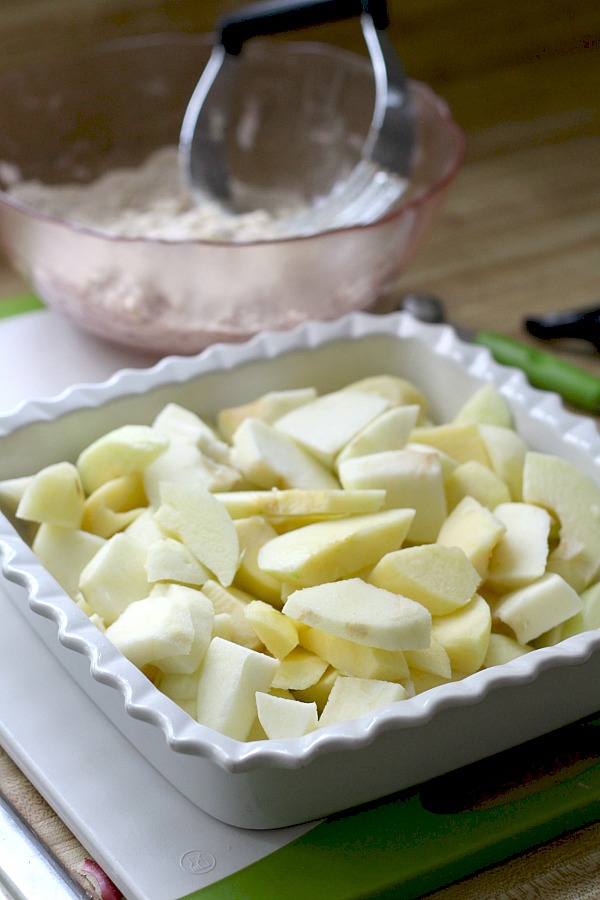 Classic apple crisp is so easy and delicious! A crumb topping of brown sugar and cinnamon over tender apples. Serve warm with a scoop of vanilla ice cream. 