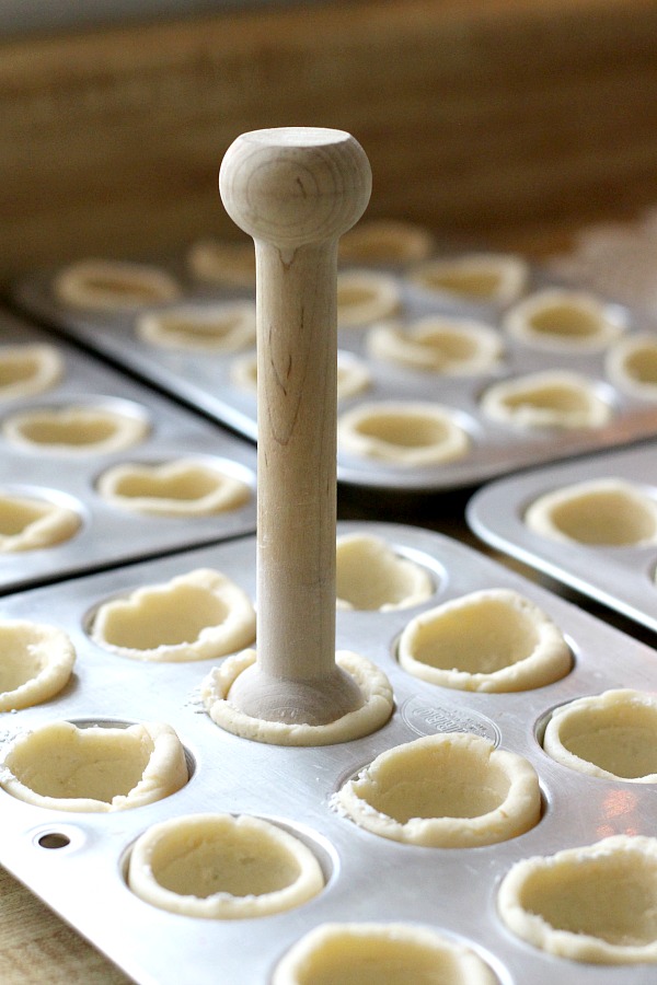 These sweet little tartlets called Pecan Tassies are like having scrumptious, bite-sized pecan pie. Sweet filling in a cream cheese pastry cup, they are also known as Nut Lassies.