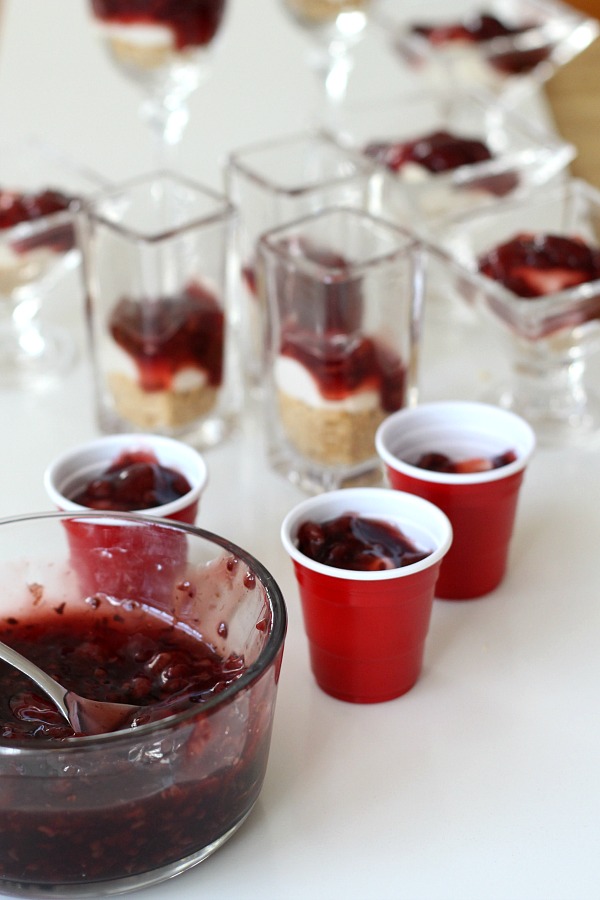 Easy No-Bake Raspberry and Pistachio Cheesecake Parfaits are so pretty and taste delicious. Make tiny, shot-size or fill you fanciest glasses. Change the fruit pie filling or use fresh fruit. It is up to you and it is all good!