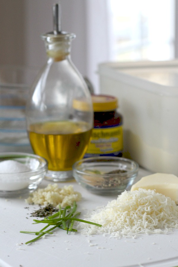 Cracked Pepper, Parmesan and Herbed Bread is full of flavor, slices beautifully and great for sandwiches or buttered and served with soup or salad. Easy recipe dough is made in a bread maker and shaped as desired. Allow to rise, bake and enjoy!