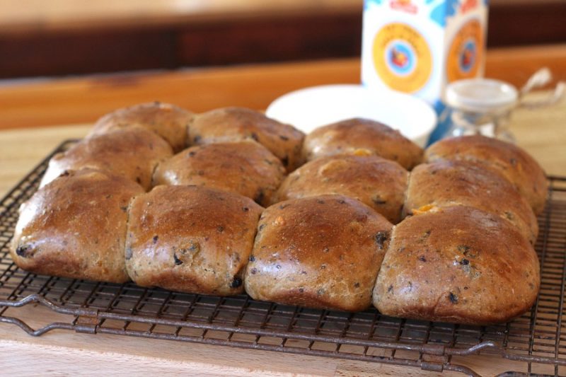 Hot Cross Buns are an Easter tradition and a lovely, sweet breakfast treat with the warm flavor of cinnamon. Dough is made easily in a bread machine then shaped and baked in a dish. Frosting is piped on top in the shape of the cross. Perfect addition for brunch with hard-boiled, colored eggs.