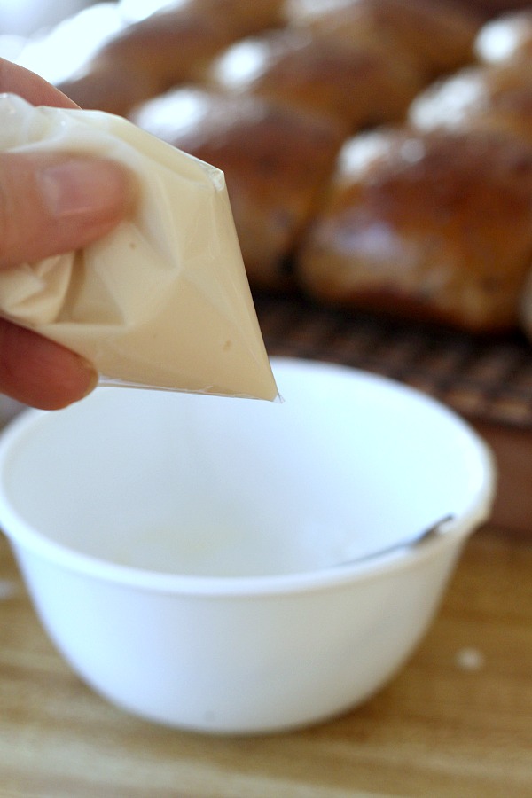 Hot Cross Buns are an Easter tradition and a lovely, sweet breakfast treat with the warm flavor of cinnamon. Dough is made easily in a bread machine then shaped and baked in a dish. Frosting is piped on top in the shape of the cross. Perfect addition for brunch with hard-boiled, colored eggs.