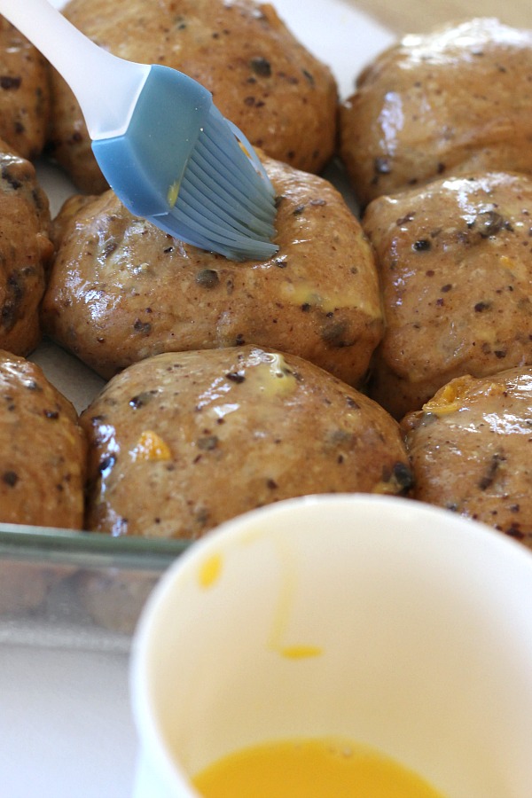 Hot Cross Buns are an Easter tradition and a lovely, sweet breakfast treat with the warm flavor of cinnamon. Dough is made easily in a bread machine then shaped and baked in a dish. Frosting is piped on top in the shape of the cross. Perfect addition for brunch with hard-boiled, colored eggs.