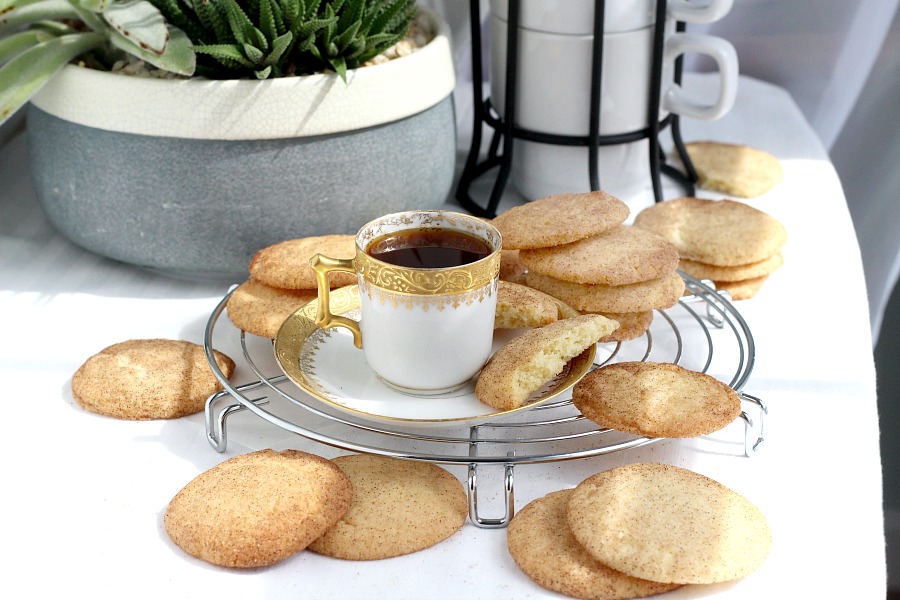 Easy recipe for classic Snickerdoodles. Buttery cookies rolled in cinnamon sugar and baked until edges are crisp and centers are soft. Delicious served with coffee or as an after school treat for kids with glasses of cold milk. 