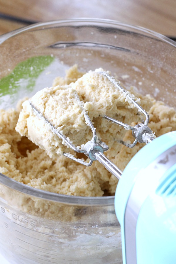 Easy recipe for classic Snickerdoodles. Buttery cookies rolled in cinnamon sugar and baked until edges are crisp and centers are soft. Delicious served with coffee or as an after school treat for kids with glasses of cold milk. 