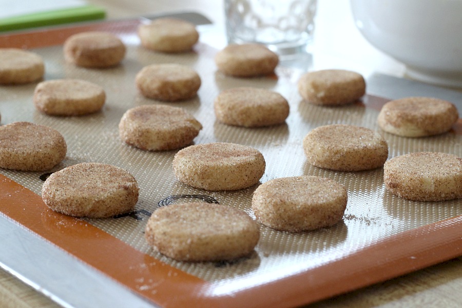 Easy recipe for classic Snickerdoodles. Buttery cookies rolled in cinnamon sugar and baked until edges are crisp and centers are soft. Delicious served with coffee or as an after school treat for kids with glasses of cold milk. 