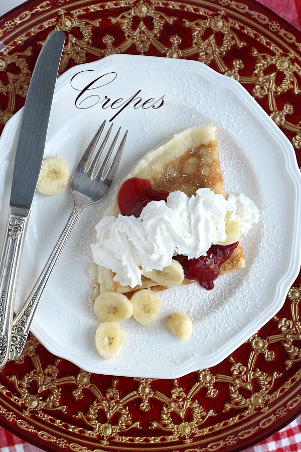 An easy, simple crepe, filled with a sweetened cream cheese mixture and dusted with confectioners' sugar is a classic. Spoon on fruit pie filling and a dollop of whipped cream to finish this lovely dessert.