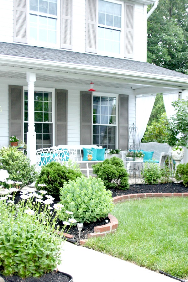 A little updating and decorating to give the front porch some curb appeal. Summer on the porch is the perfect place for quiet time or entertaining.