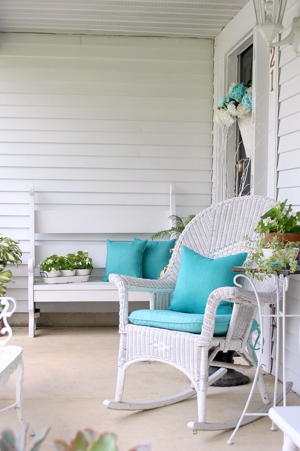 A little updating and decorating to give the front porch some curb appeal. Summer on the porch is the perfect place for quiet time or entertaining.