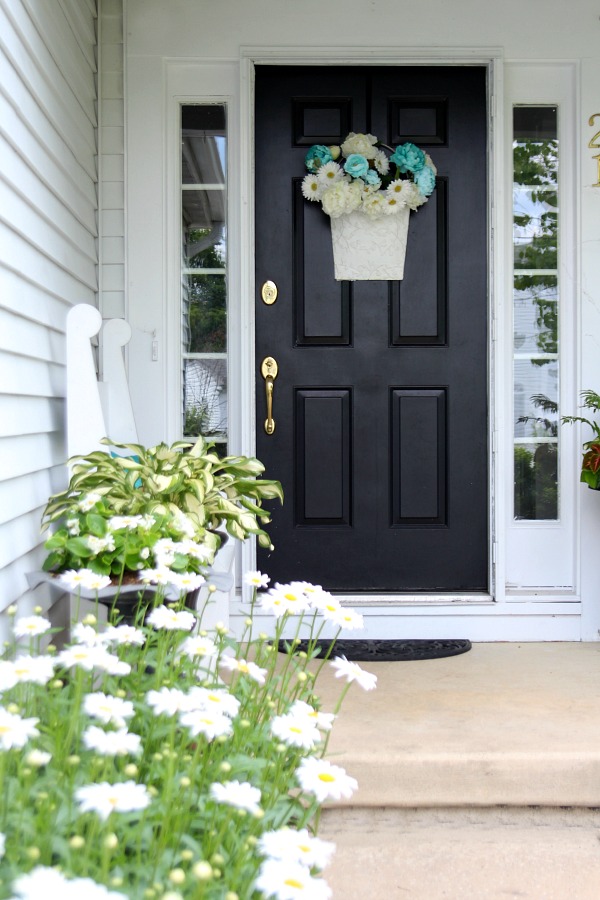 A little updating and decorating to give the front porch some curb appeal. Summer on the porch is the perfect place for quiet time or entertaining.