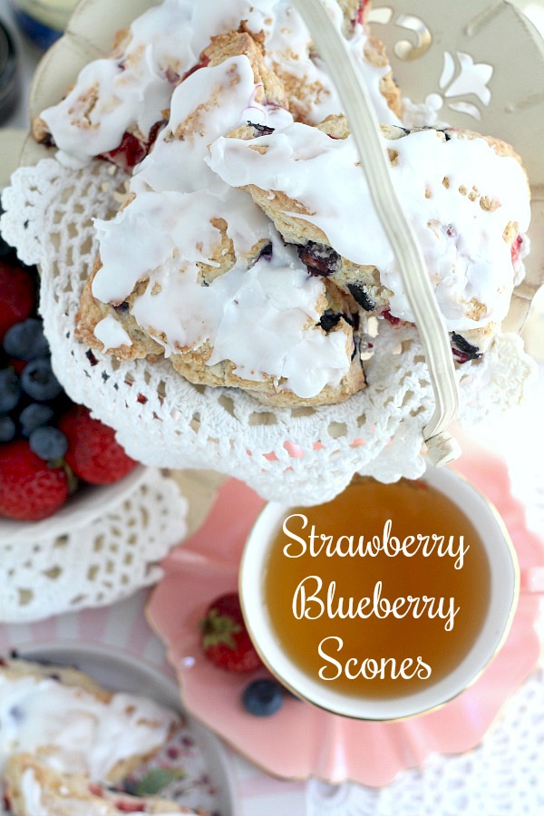 Brighten breakfast or tea time with this easy recipe for frosted Strawberry blueberry scones. Lovely for Mother's Day or to share with friends & coworkers.