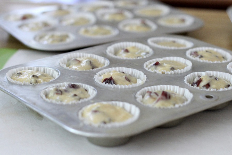 Both cherries and chocolate chips are folded into the batter of these delicious glazed Cherry Chocolate Chip Muffins. Perfect breakfast or snacking treat.