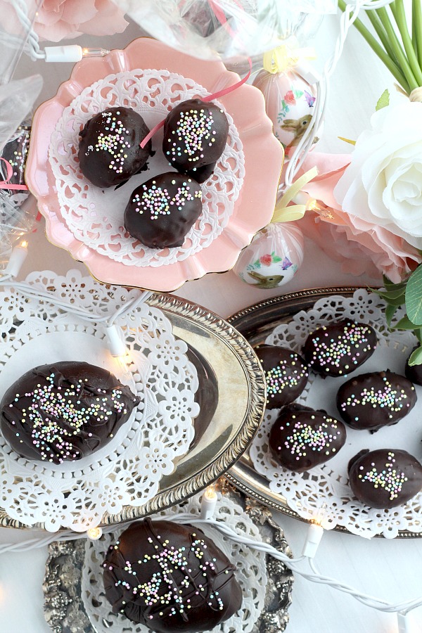 Coconut buttercream Easter eggs are such a happy memory from childhood. I remember how pretty they looked in my Easter basket. They took the place of honor amid the colored hard-boiled eggs, tall chocolate bunny, jelly beans. Try these easy-to-make homemade chocolate covered coconut Easter eggs.