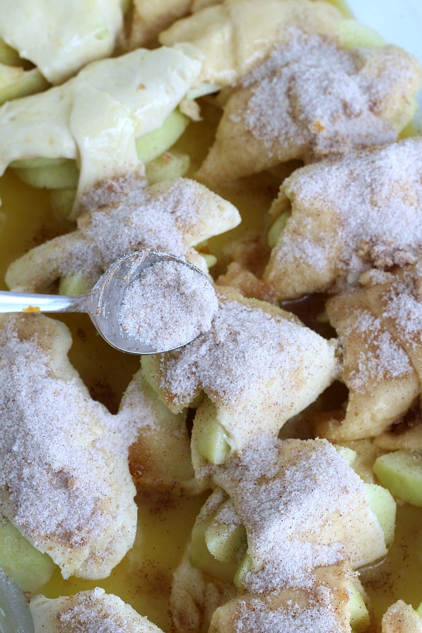 Super easy recipe for autumns favorite fruit, Apple Bundles are made with crescent rolls, cinnamon with a hint of orange. They smell heavenly and are perfect warm from the oven with a scoop of ice cream.