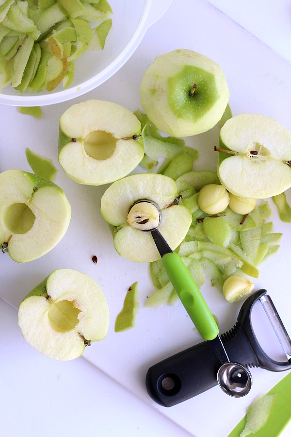 Super easy recipe for autumns favorite fruit, Apple Bundles are made with crescent rolls, cinnamon with a hint of orange. They smell heavenly and are perfect warm from the oven with a scoop of ice cream.