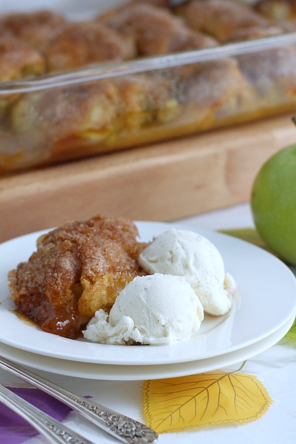 Super easy recipe for autumns favorite fruit, Apple Bundles are made with crescent rolls, cinnamon with a hint of orange. They smell heavenly and are perfect warm from the oven with a scoop of ice cream.