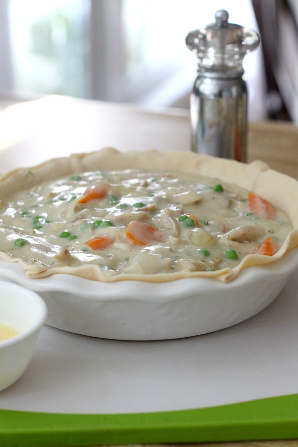 Chicken Pot pie is an all-time favorite comfort food and for good reason. Chunks of tender chicken, carrots and peas in a creamy gravy with a flaky, golden pie crust. A great meal for Sunday dinner or a family weeknight meal. Make it easy and cut prep time by using rotisserie chicken and frozen vegetables.