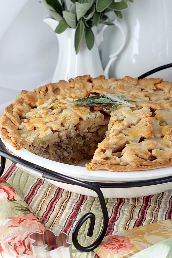 Pork and Apple Pie with sage is a delicious flavor combo of savory and a hint of sweetness in a flaky crust. Sliced apples are layered on top of a filling of seasoned ground pork making a lovely Sunday or weeknight dinner.